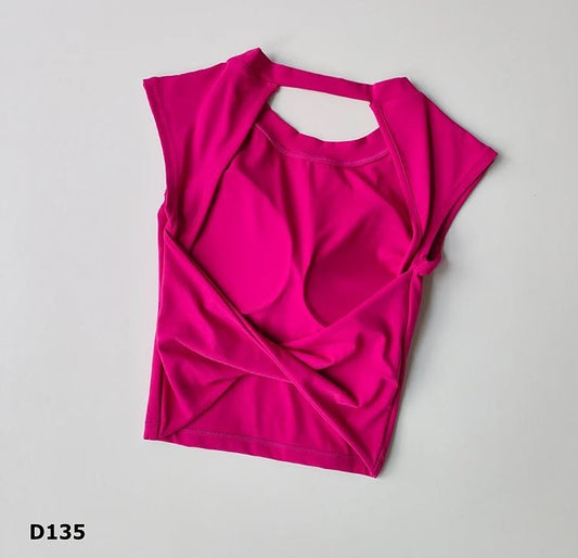 Top deportivo con aumento color fucsia y negro