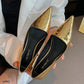 Zapato de tacón bajo color dorado